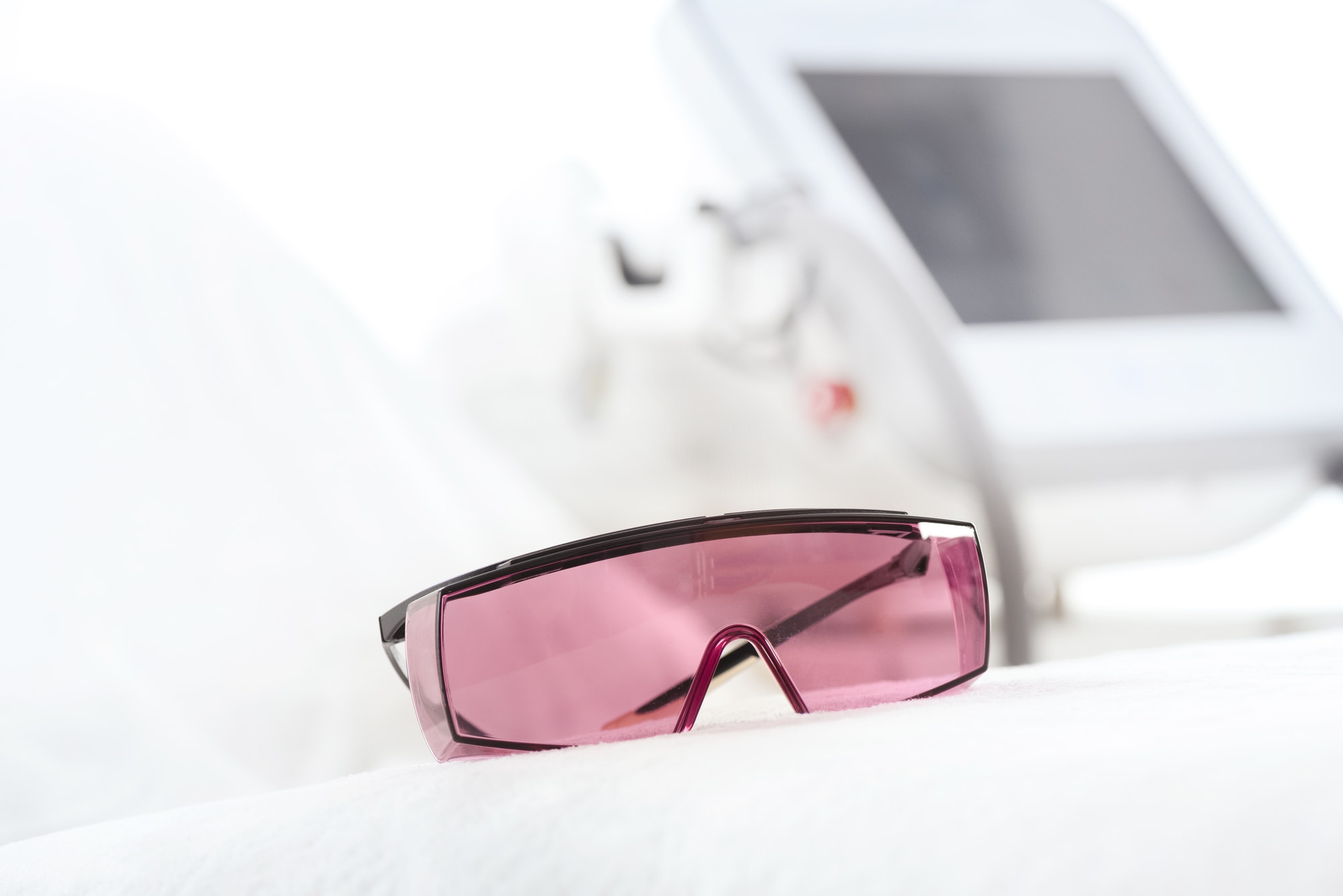 Close-up view of UV protective glasses for laser skin care